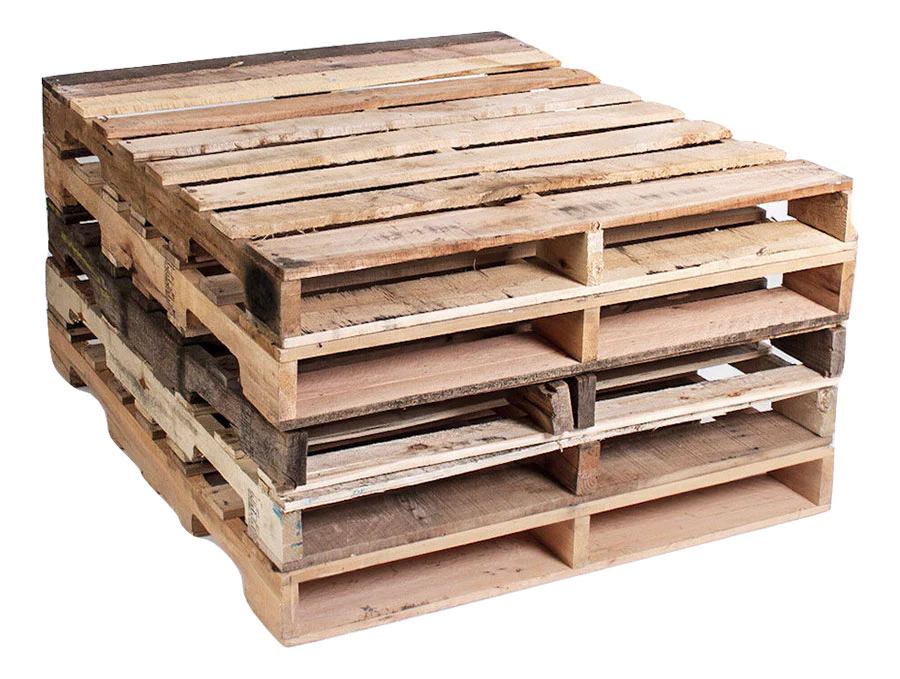 An upcycled coffee table made from reclaimed wood pallets placed in a stylish living room setting.